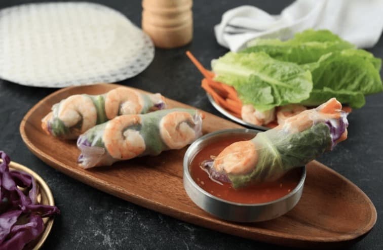 Fresh shrimp rolls with lettuce and dipping sauce at Sakura Asian Dining & Bar